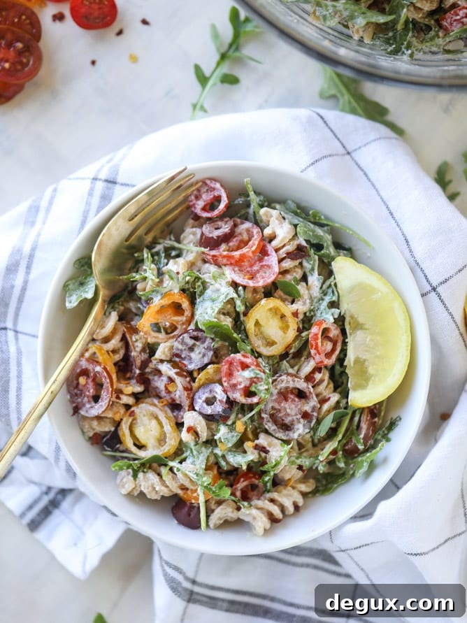 creamy goat cheese and arugula pasta salad I howsweeteats.com