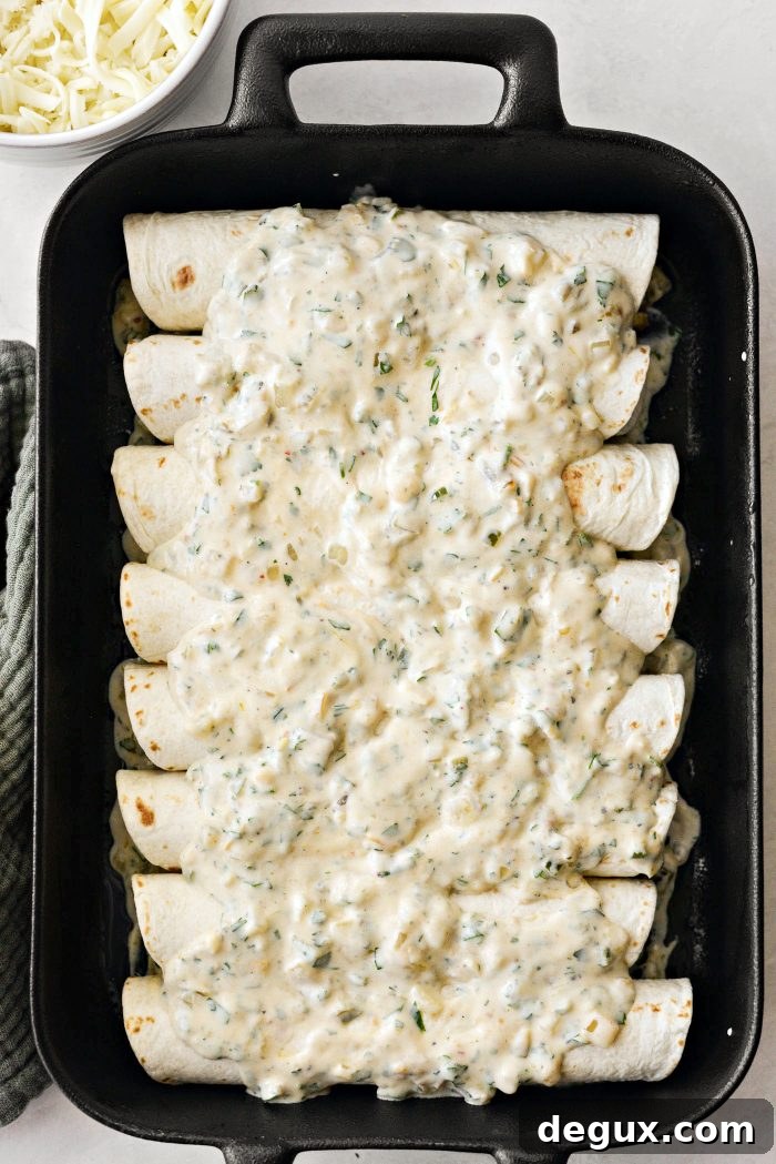 Cheesy Beef Enchiladas with Salsa Verde Recipe 13 pour remaining sauce over top of the enchiladas