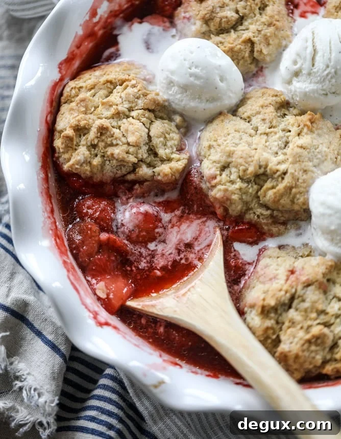 Fresh Strawberry Cobbler Recipe — Classic Summer Dessert 7 fresh strawberry cobbler I howsweeteats.com