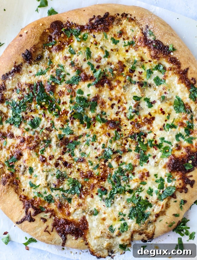 White Clam and Chili Oil Pizza Recipe: Savory Seafood Pie 5 white clam sauce pizza I howsweeteats.com