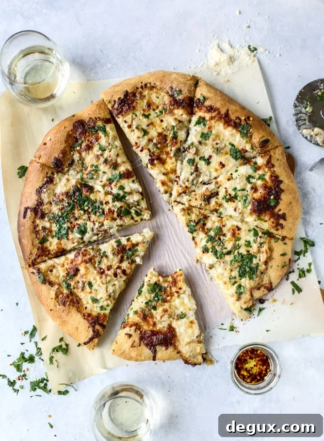 White Clam and Chili Oil Pizza Recipe: Savory Seafood Pie 7 white clam sauce pizza I howsweeteats.com