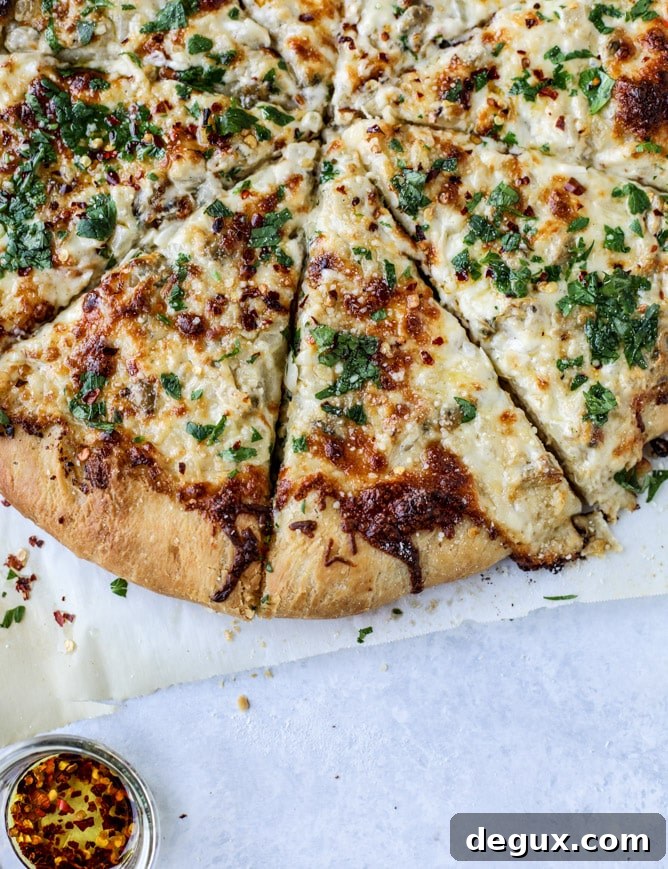 White Clam and Chili Oil Pizza Recipe: Savory Seafood Pie 10 white clam sauce pizza I howsweeteats.com