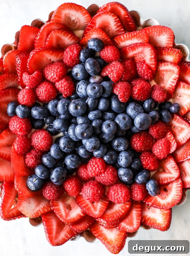 Triple-Berry Star No-Bake Cheesecake Tart (Video) 4 no-bake cheesecake triple berry star tart closeup