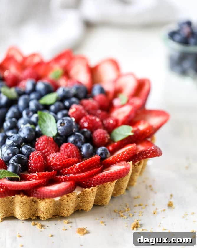 Triple-Berry Star No-Bake Cheesecake Tart (Video) 7 cheesecake tart with berries