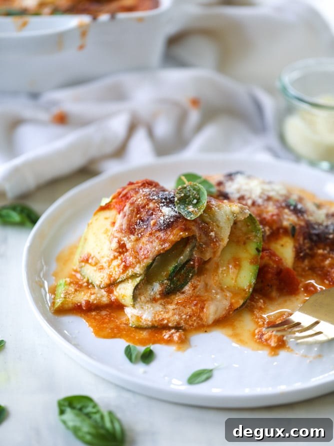 Cheesy Zucchini Roll-Ups (Video Guide) 10 cheesy zucchini roll-ups I howsweeteats.com