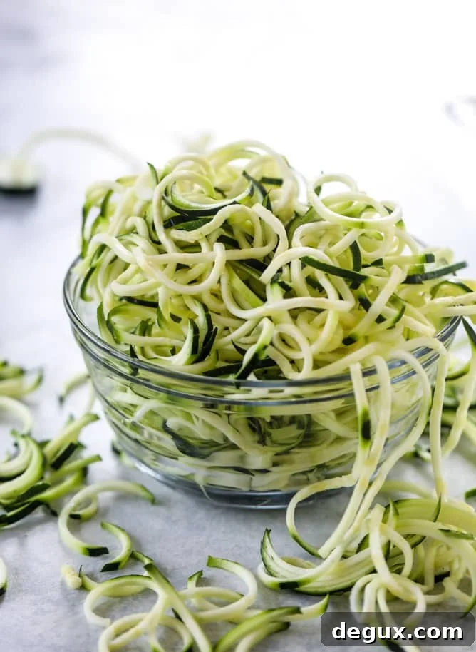 Summer Shrimp Zoodle Bowls with Lemon Garlic Dressing 4 summer shrimp zoodle bowls I howsweeteats.com