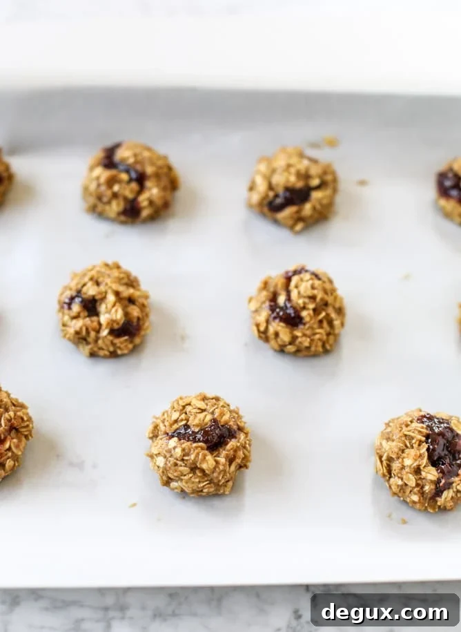 peanut butter and jelly breakfast cookies I howsweeteats.com