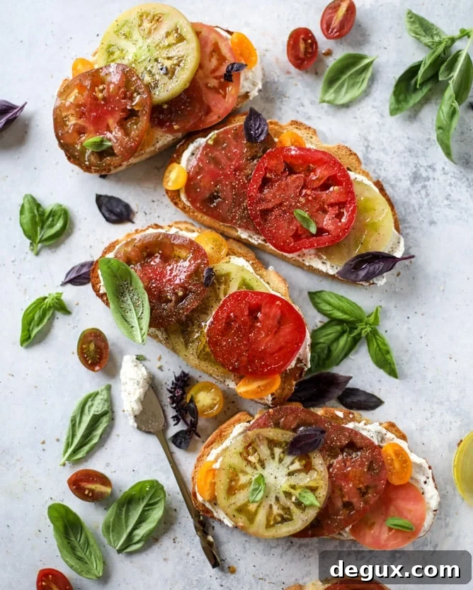 heirloom tomato garlic toast with basil whipped feta I howsweeteats.com