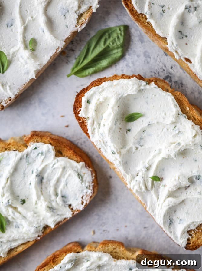heirloom tomato garlic toast with basil whipped feta I howsweeteats.com