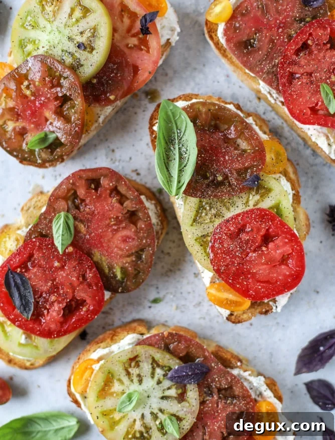 heirloom tomato garlic toast with basil whipped feta I howsweeteats.com