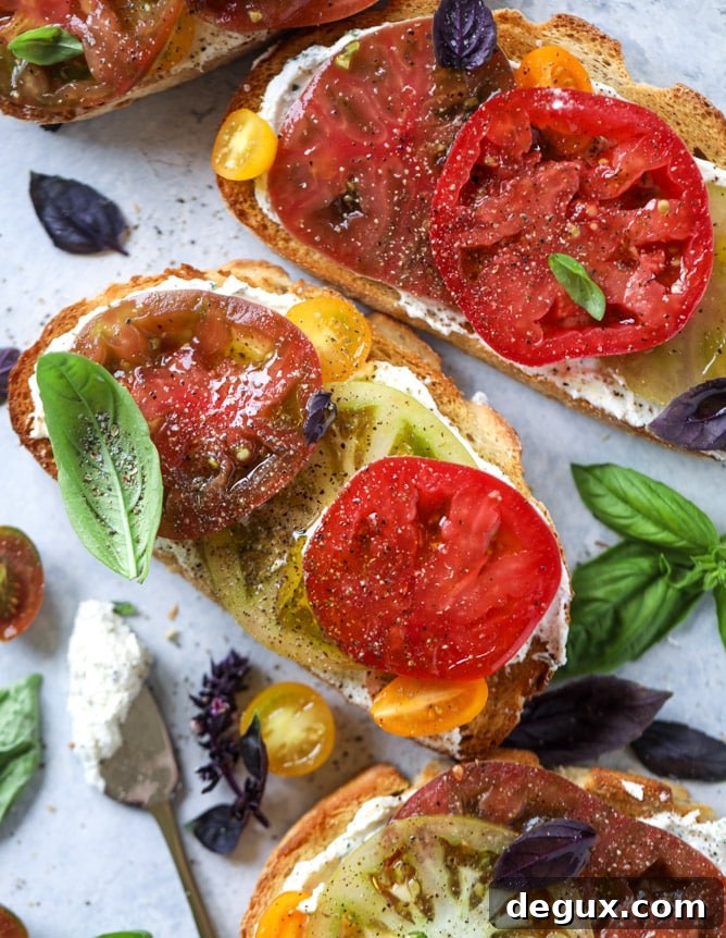heirloom tomato garlic toast with basil whipped feta I howsweeteats.com