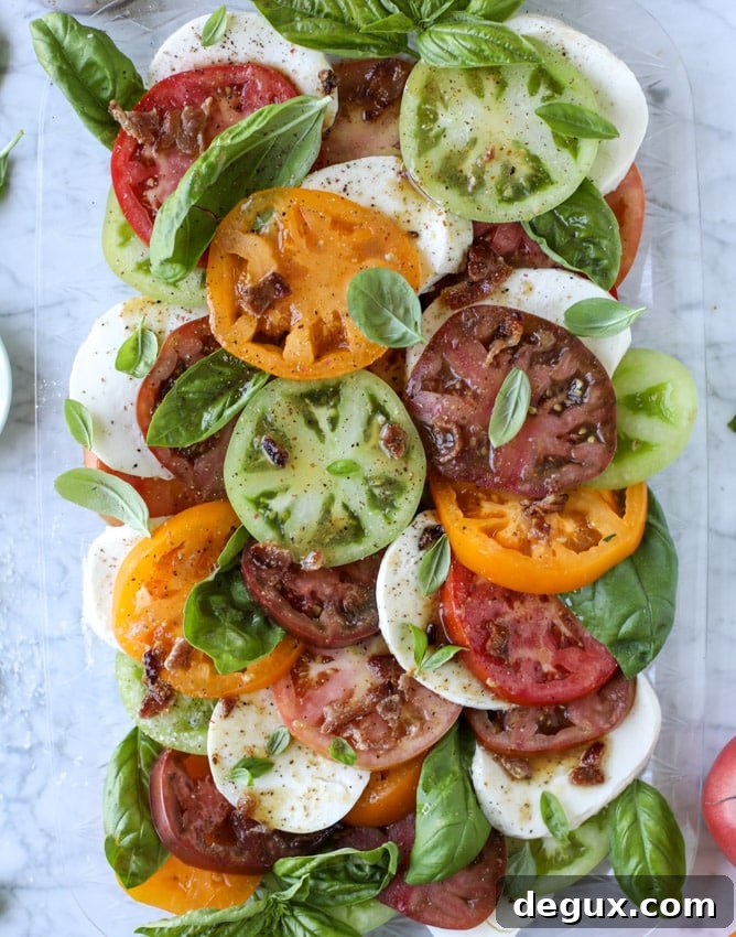 caprese salad with heirloom tomatoes and hot bacon dressing I howsweeteats.com