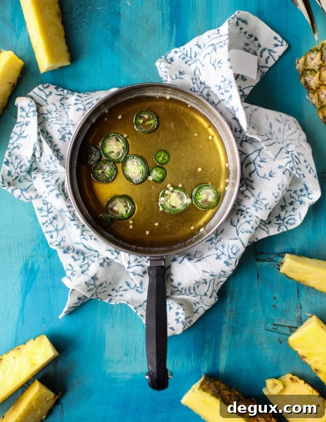 Spicy Honey-Glazed Pineapple Wedges for Grilling 3 hot honey pineapple wedges I howsweeteats.com