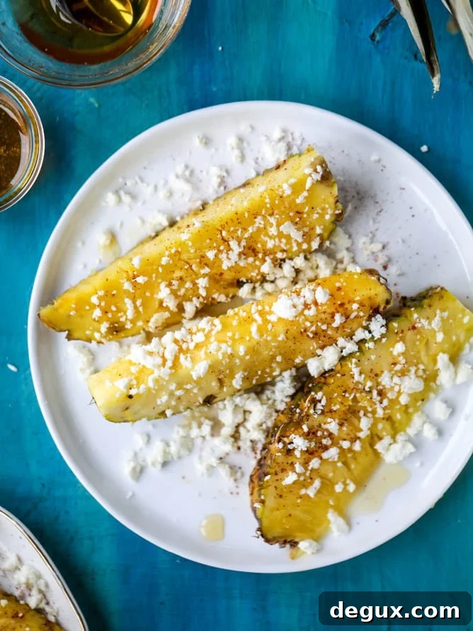 Spicy Honey-Glazed Pineapple Wedges for Grilling 4 hot honey pineapple wedges I howsweeteats.com