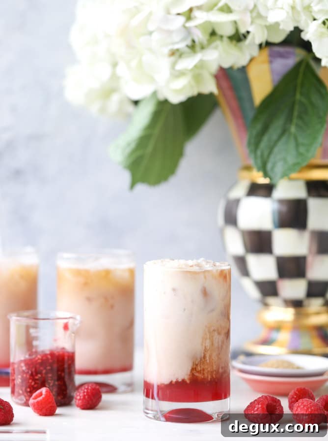 Refreshing Iced Raspberry Latte Recipe for Summer Cafés 2 iced raspberry lattes I howsweeteats.com