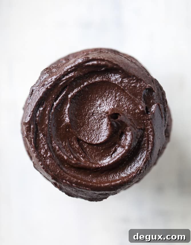 Chocolate Zucchini Cupcakes with Creamy Avocado Fudge Frosting 8 chocolate zucchini cupcakes with avocado frosting I howsweeteats.com