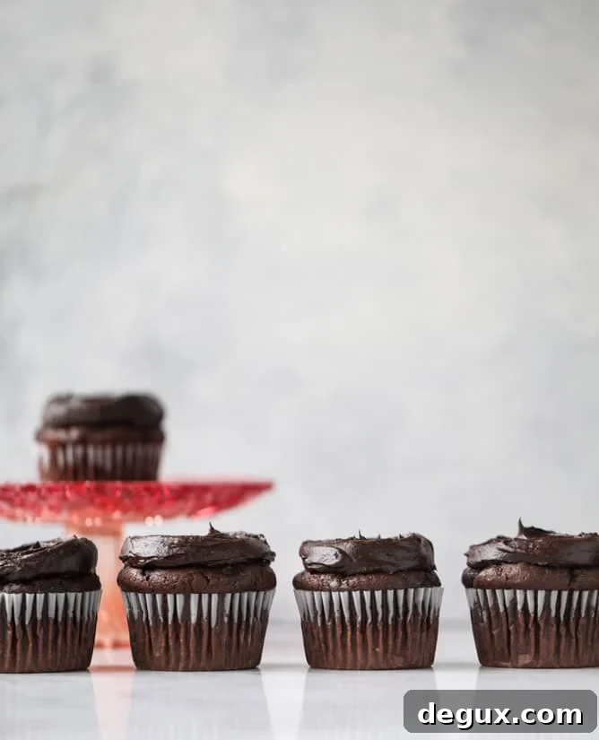 Chocolate Zucchini Cupcakes with Creamy Avocado Fudge Frosting 9 chocolate zucchini cupcakes with avocado frosting I howsweeteats.com