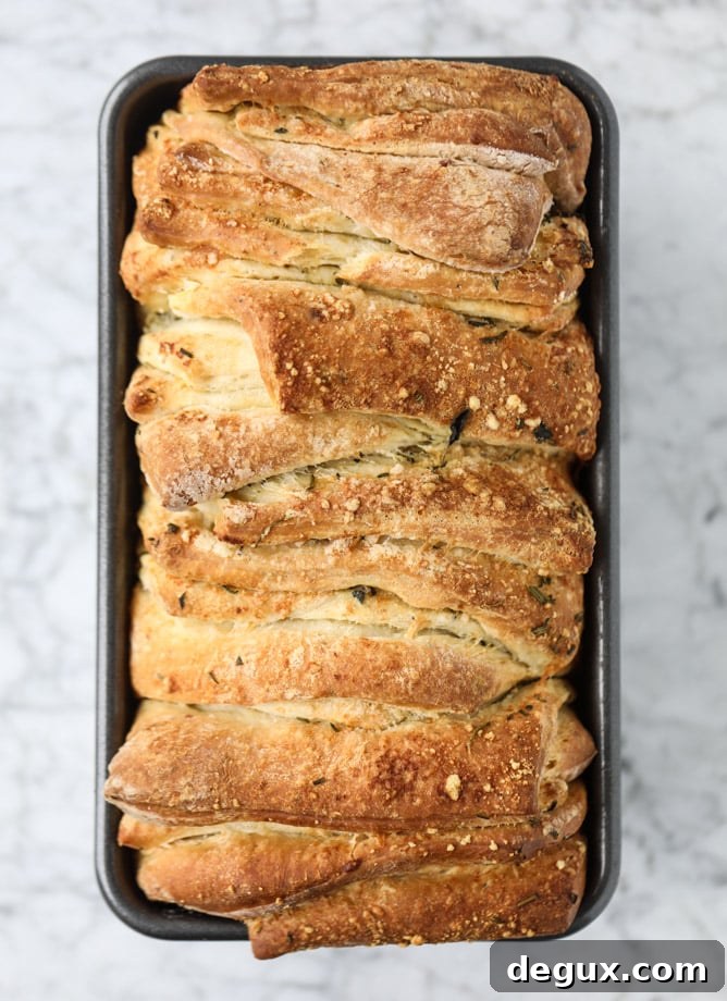roasted garlic parmesan herb pull-apart bread I howsweeteats.com