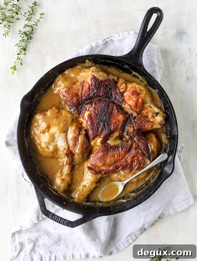 smothered skillet chicken with thyme butter mushrooms I howsweeteats.com