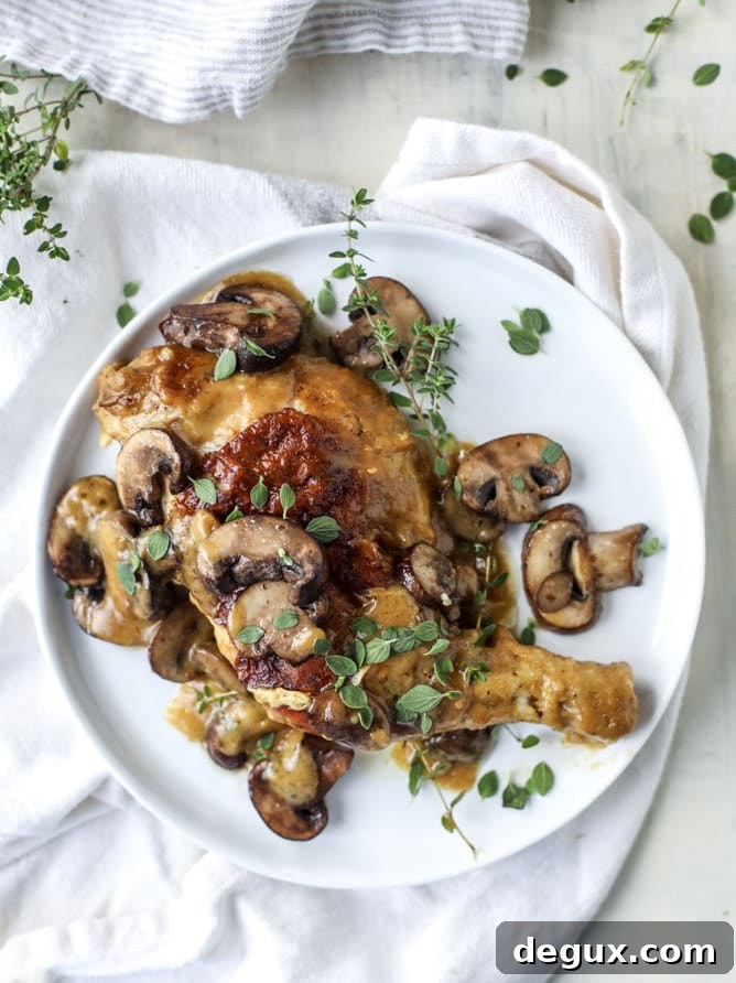 smothered skillet chicken with thyme butter mushrooms I howsweeteats.com