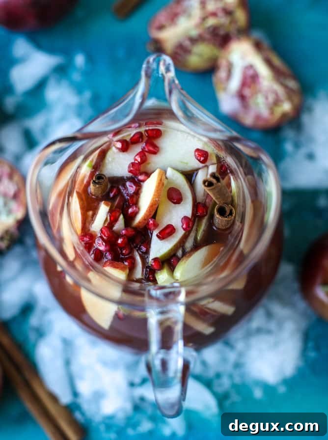 Sparkling Pomegranate Cider Punch Recipe for Fall Gatherings 3 sparkling pomegranate cider punch I howsweeteats.com