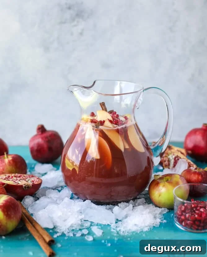 Sparkling Pomegranate Cider Punch Recipe for Fall Gatherings 4 sparkling pomegranate cider punch I howsweeteats.com