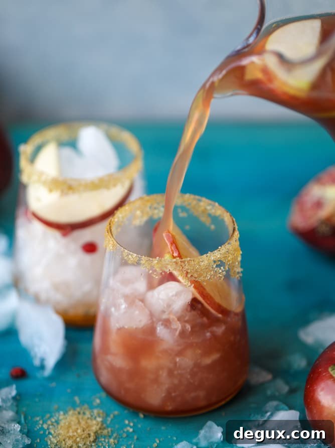 Sparkling Pomegranate Cider Punch Recipe for Fall Gatherings 5 sparkling pomegranate cider punch I howsweeteats.com