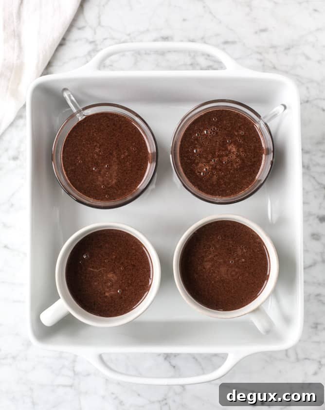 Hot Chocolate Pots de Crème with Toasted Marshmallow Topping 3 hot chocolate and toasted marshmallow pots de creme I howsweeteats.com