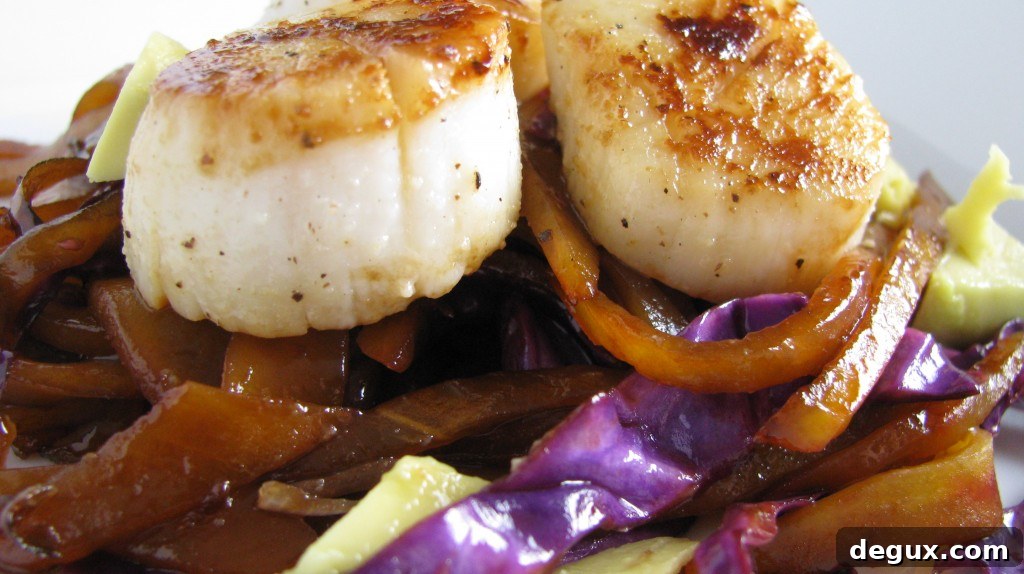 Seared scallops with caramelized mango slaw