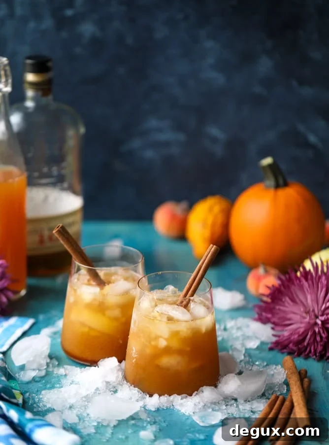 Friendsgiving Pumpkin Bourbon Smash Cocktail Recipe 8 pumpkin pie bourbon smash I howsweeteats.com