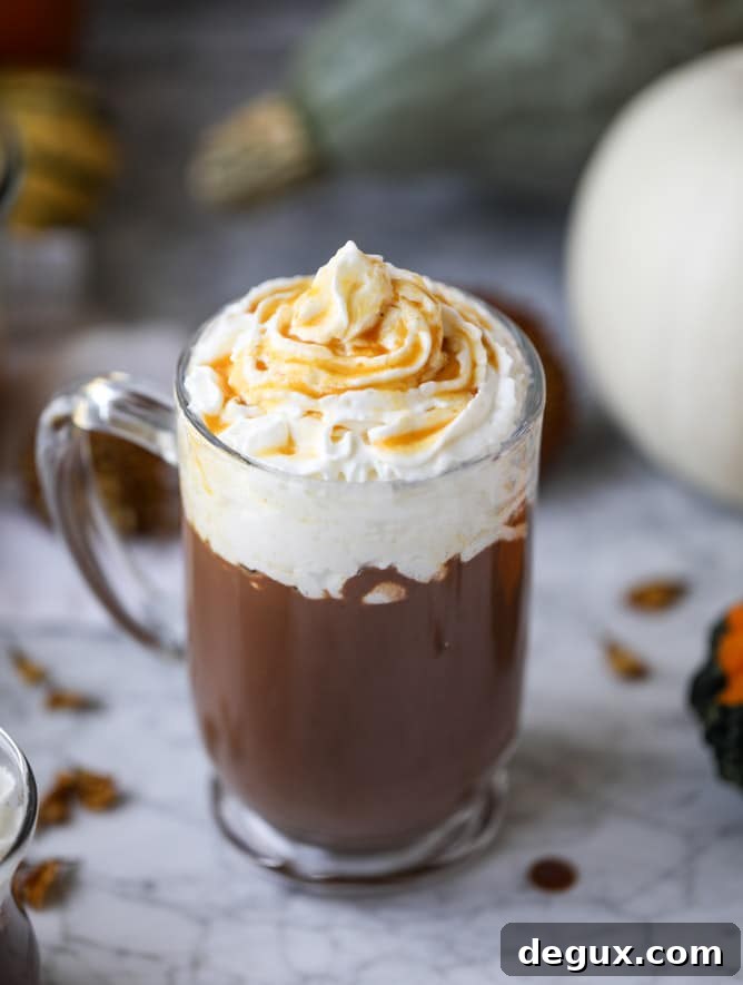 Pumpkin Coconut Hot Chocolate Recipe for Cozy Fall Nights 5 pumpkin coconut hot chocolate I howsweeteats.com #pumpkin #hotchocolate #drinks
