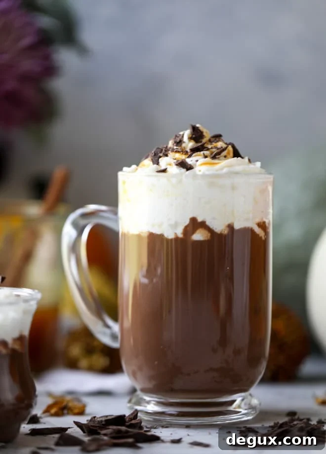 Pumpkin Coconut Hot Chocolate Recipe for Cozy Fall Nights 7 pumpkin coconut hot chocolate I howsweeteats.com #pumpkin #hotchocolate #drinks