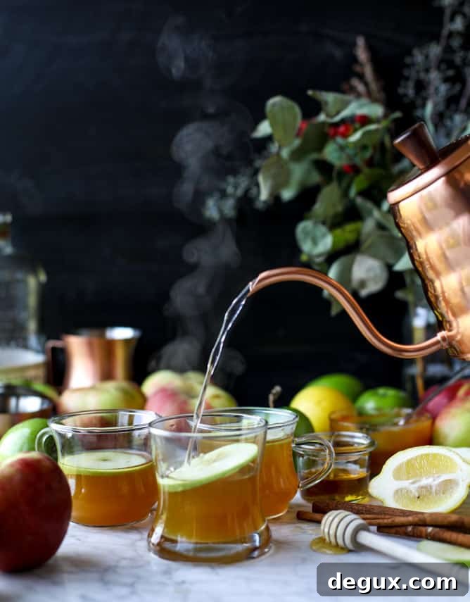 caramel apple hot toddy I howsweeteats.com #caramel #apple #cocktail