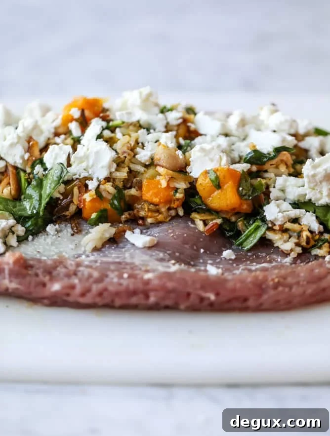 Butternut, Apple & Goat Cheese Stuffed Pork Tenderloin Recipe 3 butternut, apple and goat cheese stuffed pork tenderloin I howsweeteats.com #pork #squash #holiday #recipes