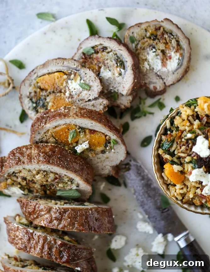 Butternut, Apple & Goat Cheese Stuffed Pork Tenderloin Recipe 7 butternut, apple and goat cheese stuffed pork tenderloin I howsweeteats.com #pork #squash #holiday #recipes