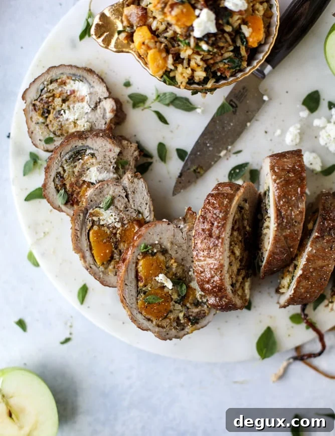 Butternut, Apple & Goat Cheese Stuffed Pork Tenderloin Recipe 10 butternut, apple and goat cheese stuffed pork tenderloin I howsweeteats.com #pork #squash #holiday #recipes