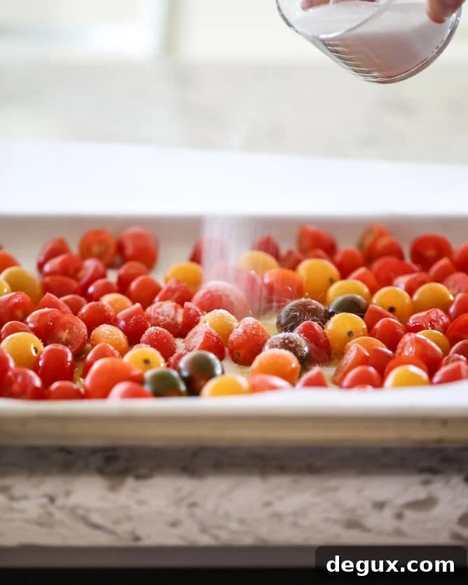 Slow-Roasted Cherry Tomato Pizza with Garlic Cream and Arugula 4 slow roasted cherry tomato pizza with garlic cream and arugula I howsweeteats.com #pizza #recipes
