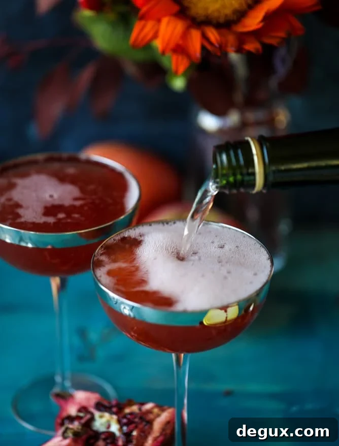 pomegranate cider mimosas with a salted caramel rim I howsweeteats.com #cocktails #thanksgiving #applecider #mimosas