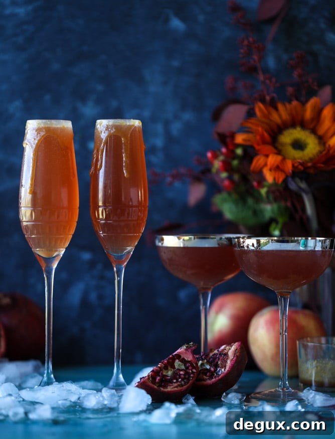 pomegranate cider mimosas with a salted caramel rim I howsweeteats.com #cocktails #thanksgiving #applecider #mimosas
