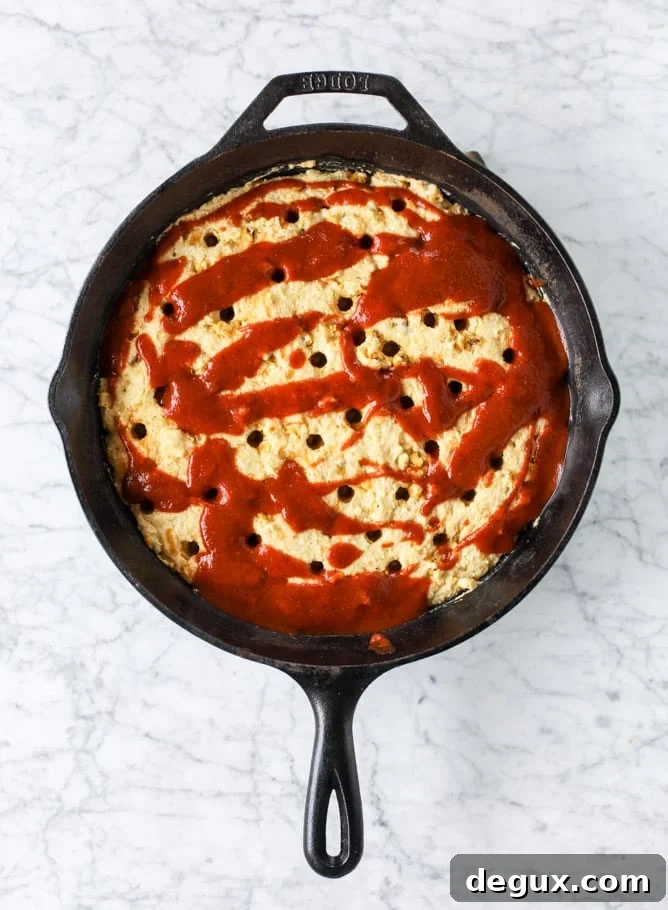 Cheesy Chicken Tamale Pie Recipe: Comforting Mexican Casserole 3 cheesy chicken tamale pie I howsweeteats.com
