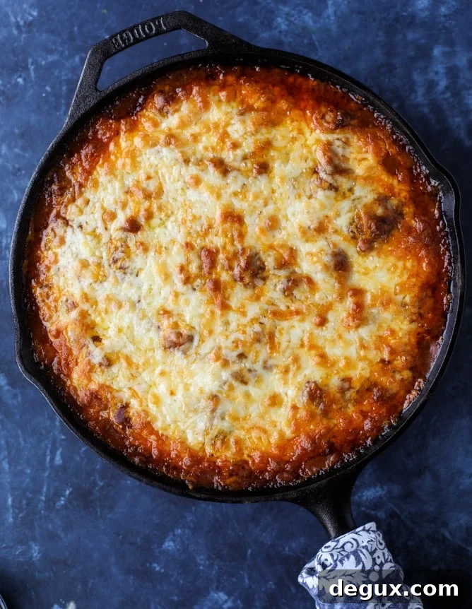 Cheesy Chicken Tamale Pie Recipe: Comforting Mexican Casserole 4 cheesy chicken tamale pie I howsweeteats.com