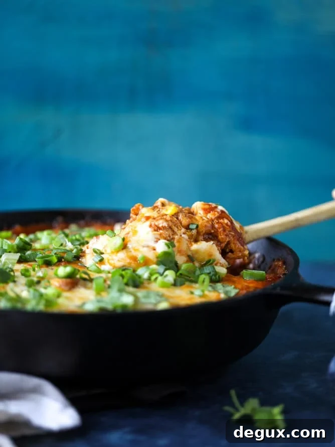 Cheesy Chicken Tamale Pie Recipe: Comforting Mexican Casserole 7 cheesy chicken tamale pie I howsweeteats.com