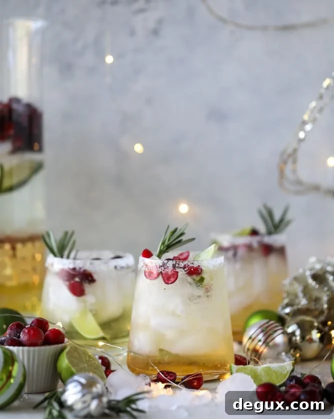 Mistletoe Margarita Recipe for Festive Holiday Cocktails 2 mistletoe margaritas I howsweeteats.com #christmas #margaritas #cocktails