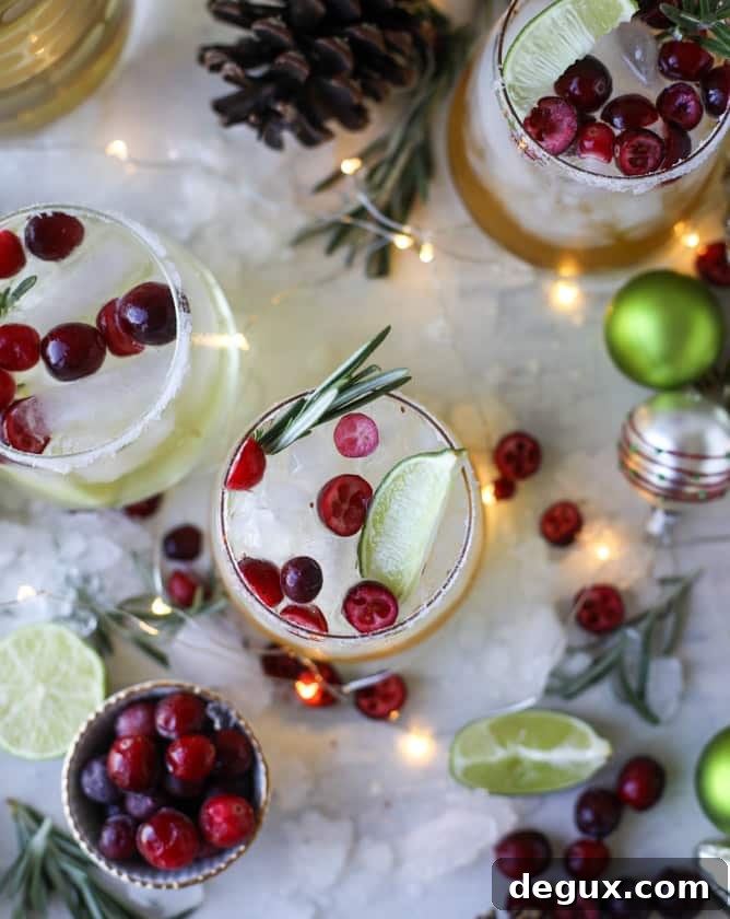 Mistletoe Margarita Recipe for Festive Holiday Cocktails 8 mistletoe margaritas I howsweeteats.com #christmas #margaritas #cocktails