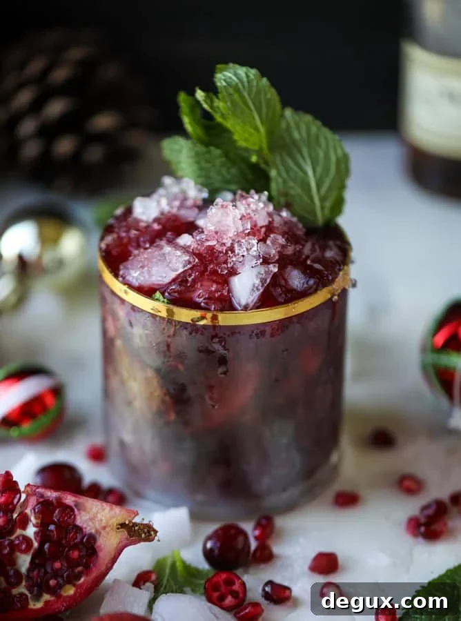 Pomegranate Cranberry Mint Julep Recipe for Festive Cocktails 5 cranberry pomegranate juleps I howsweeteats.com #cocktails #christmas #cranberry #pomegranate #mintjulep