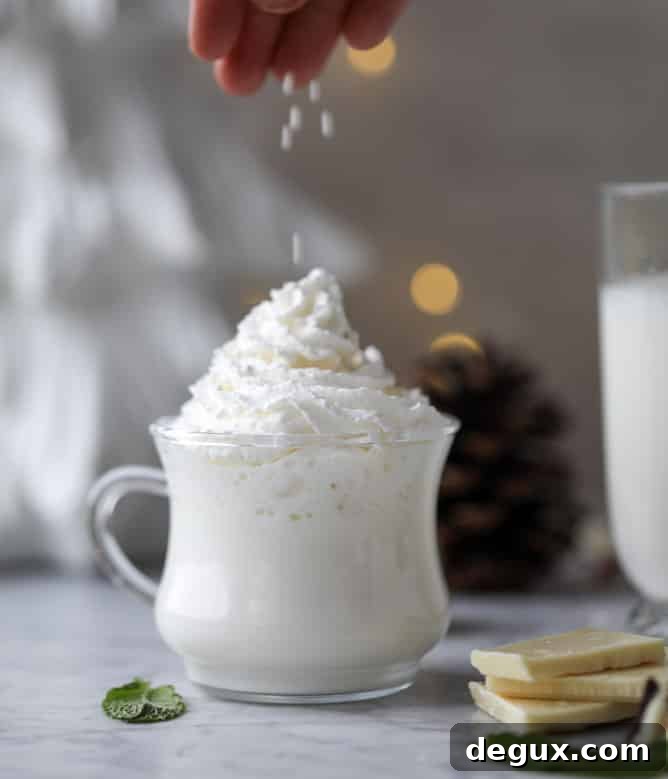 fresh mint white hot chocolate I howsweeteats.com #hotchocolate #christmas #holidays #whitechocolate