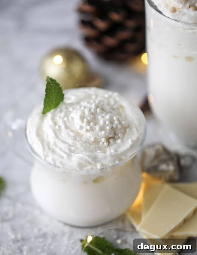 fresh mint white hot chocolate I howsweeteats.com #hotchocolate #christmas #holidays #whitechocolate