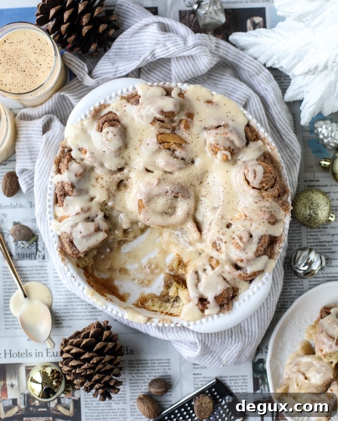 These super easy one hour cinnamon rolls are infused with eggnog and drenched in an eggnog icing with a sprinkle of fresh nutmeg.