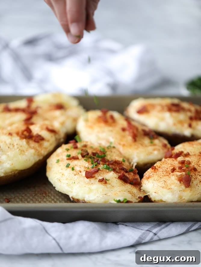 Creamy Greek Yogurt Twice-Baked Potatoes with Chives 5 greek yogurt twice baked potatoes I howsweeteats.com #potatoes #twicebaked #sidedish #christmas #holiday