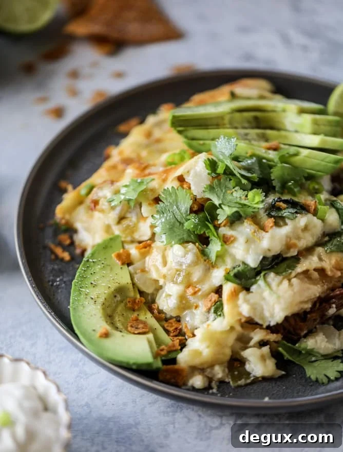 slow cooker shredded beef enchiladas I howsweeteats.com #beef #enchiladas #slowcooker